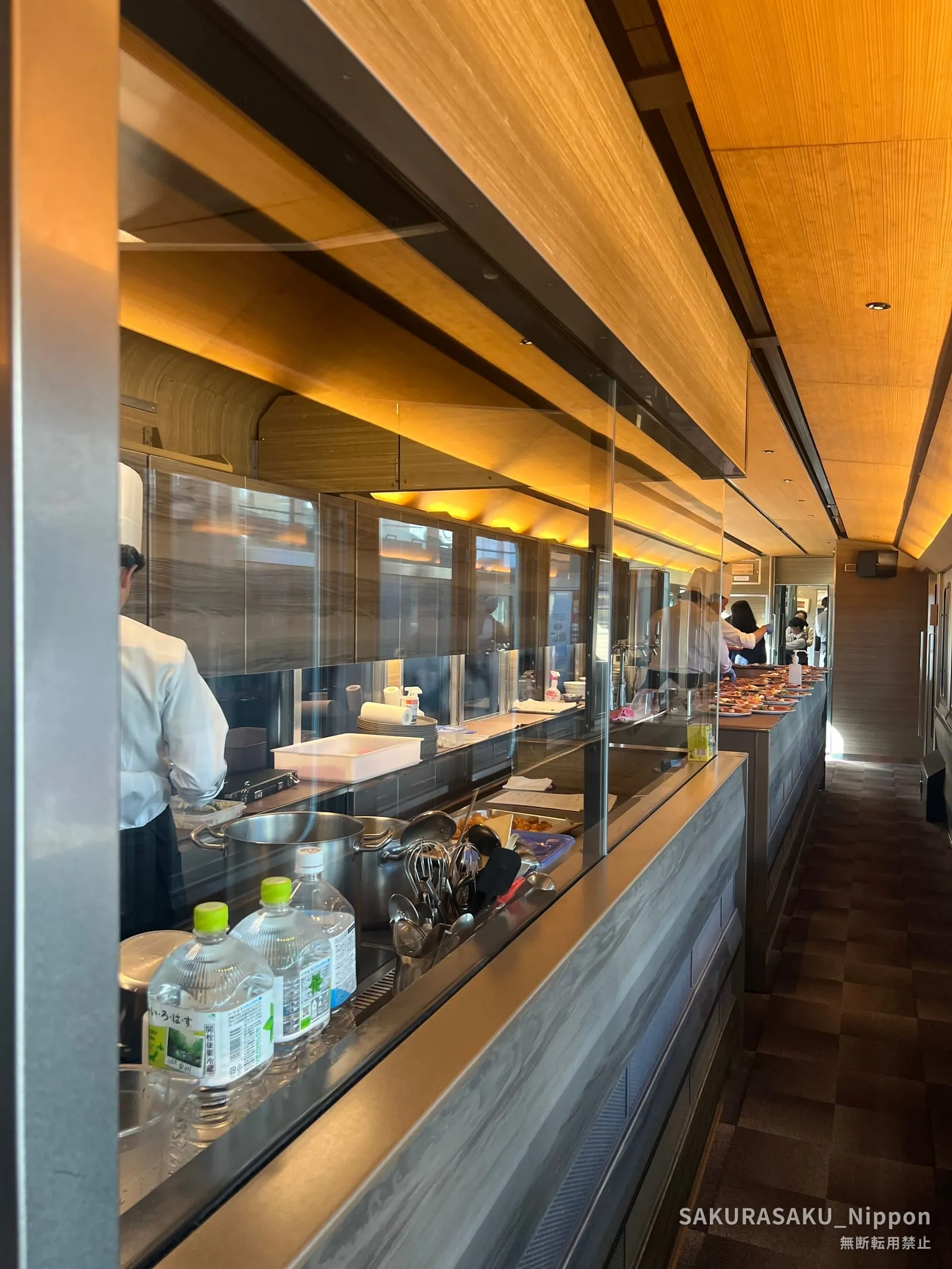 The open kitchen car aboard the train, where the chefs prepare each course
