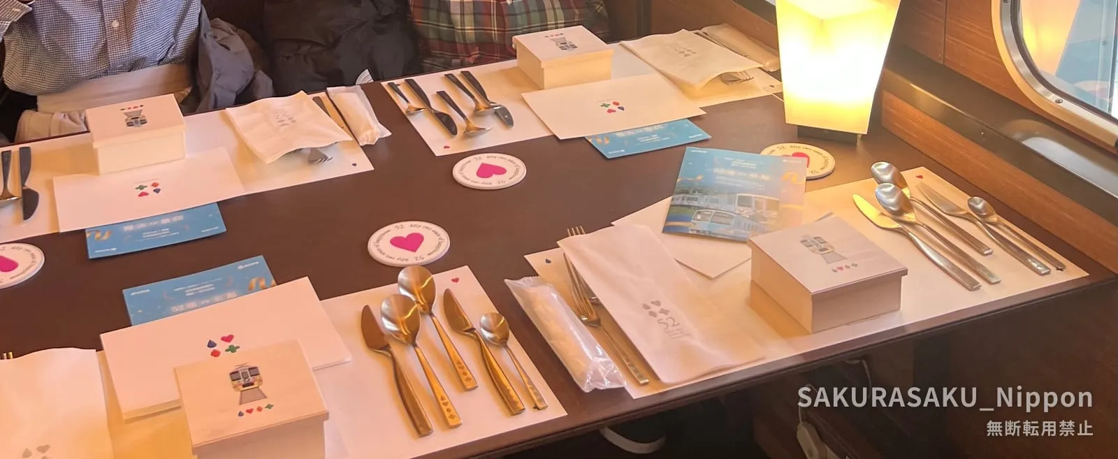 The elegant table setting aboard the 52 Seats of Happiness dining car