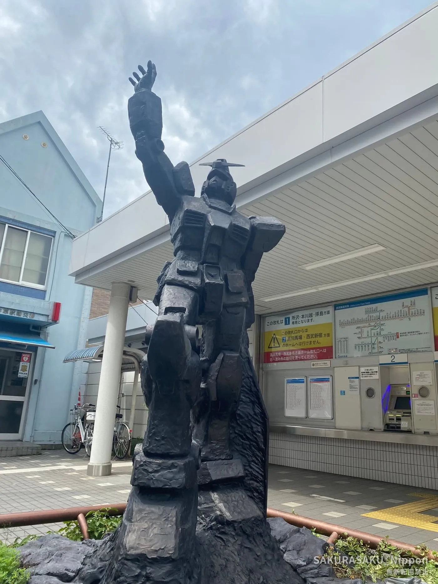 The bronze Gundam statue at the south exit of Kami-Igusa Station