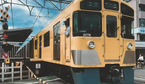Kami-Igusa Station: A Quiet Railfan Crossing in West Tokyo (with a Gundam at the Gate)