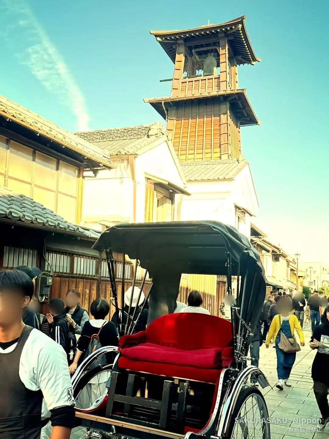 Toki no Kane seen from the street below, with a rickshaw waiting in the foreground